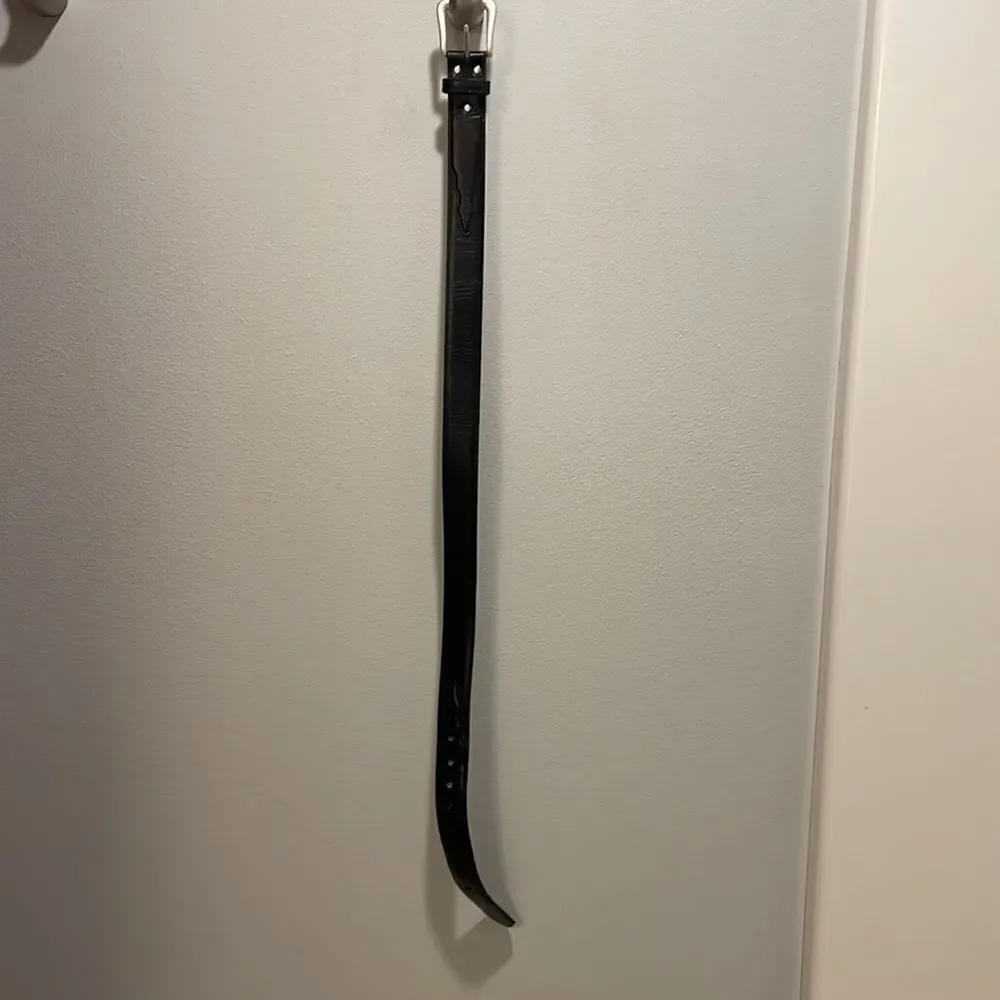Womans black leather belt